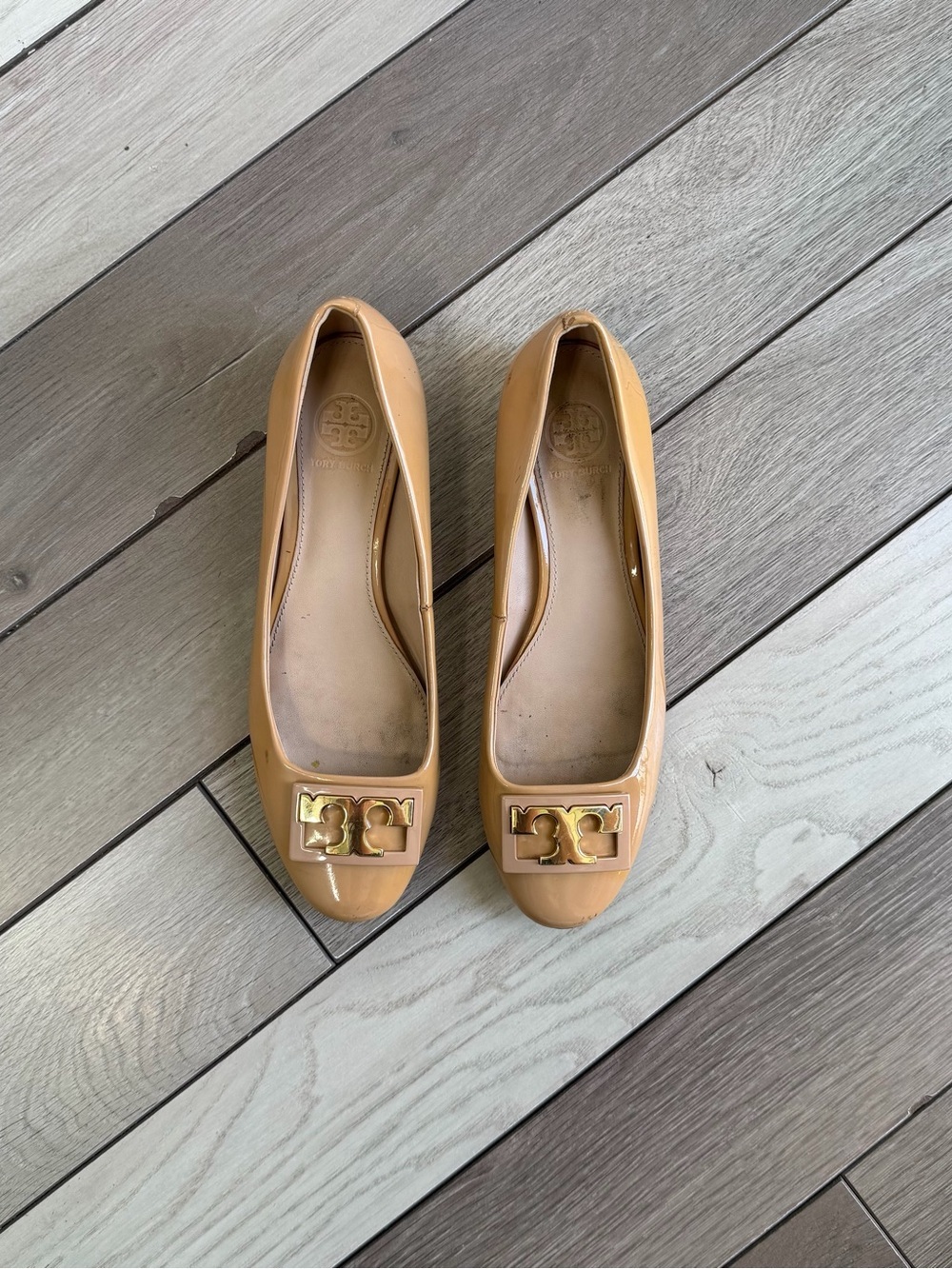Tory Burch Gigi ballet flats in a nude patent leather finish